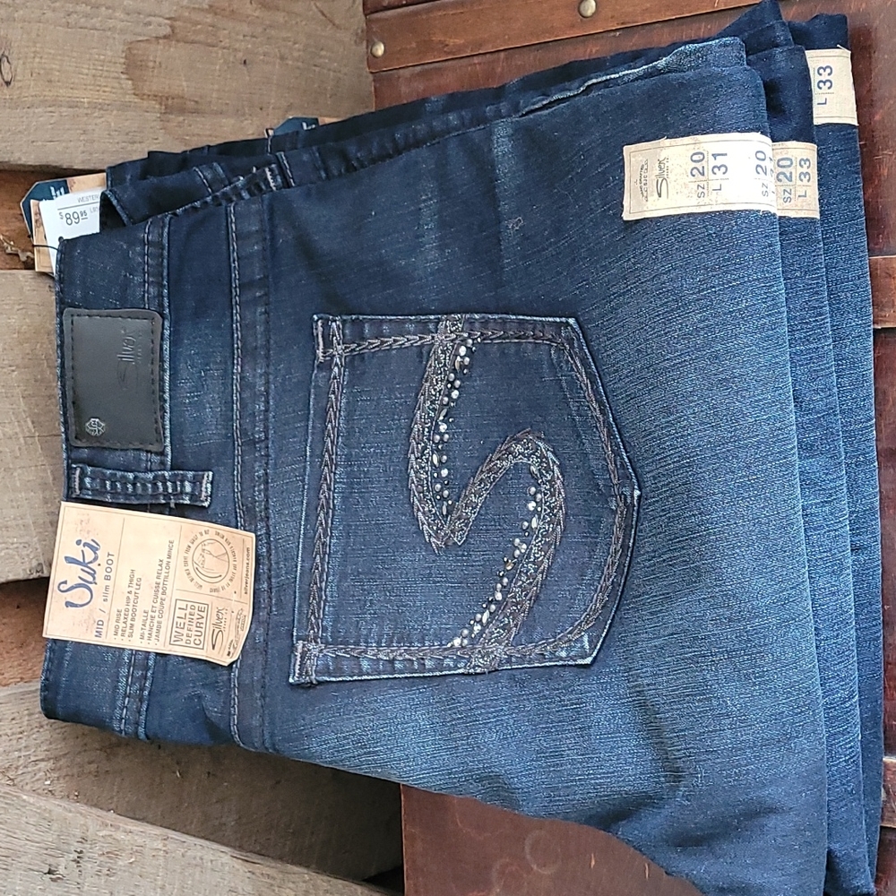 Brand new Silver mid rise, slim boot super stretch. Relaxed hip & thigh.